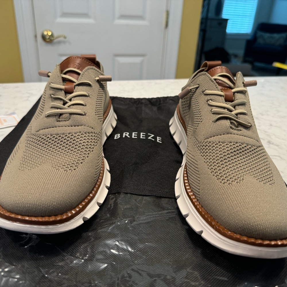 Brand new - never worn! Men’s Breeze versatile lightweight shoes.